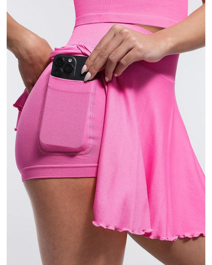 Fusta Roz Fitness cu Volane si Pantaloni Scuti Incorporați, Design 2 in 1, cu Buzunar Lateral perfecta pentru antrenament