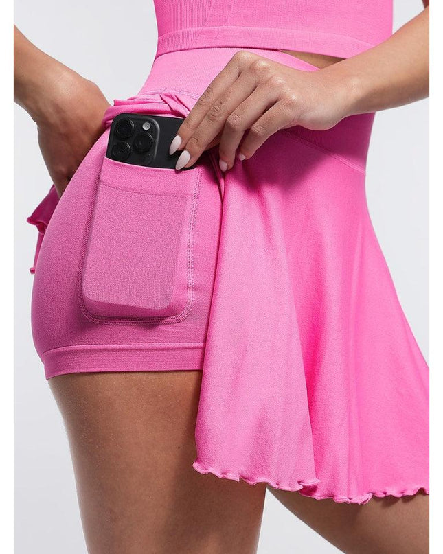 Fusta Roz Fitness cu Volane si Pantaloni Scuti Incorporați, Design 2 in 1, cu Buzunar Lateral perfecta pentru antrenament