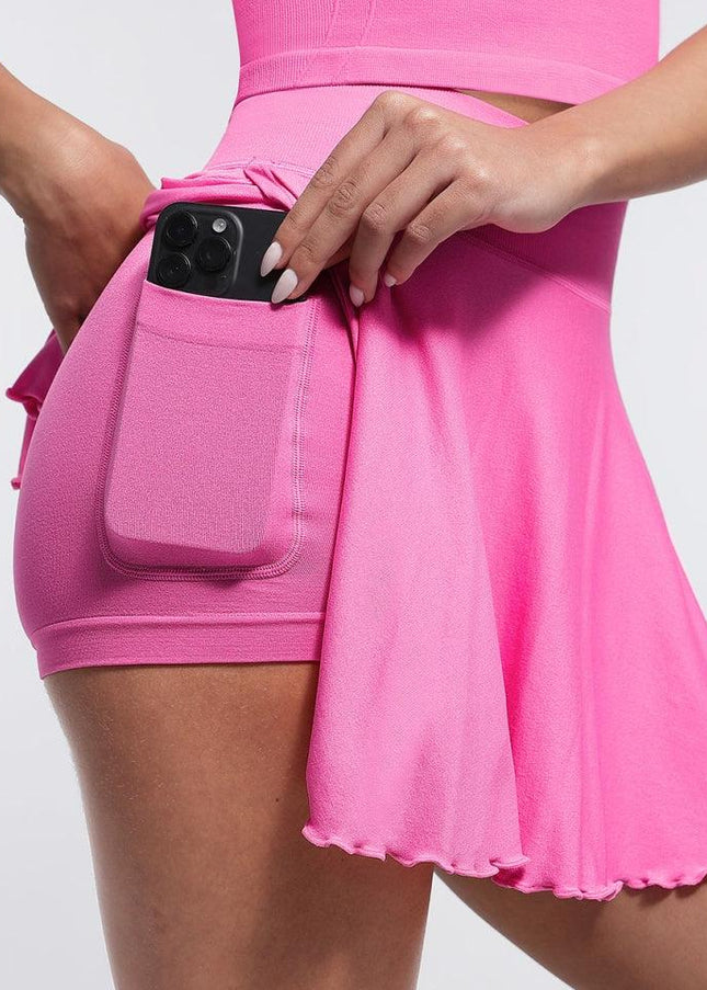 Fusta Roz Fitness cu Volane si Pantaloni Scuti Incorporați, Design 2 in 1, cu Buzunar Lateral perfecta pentru antrenament