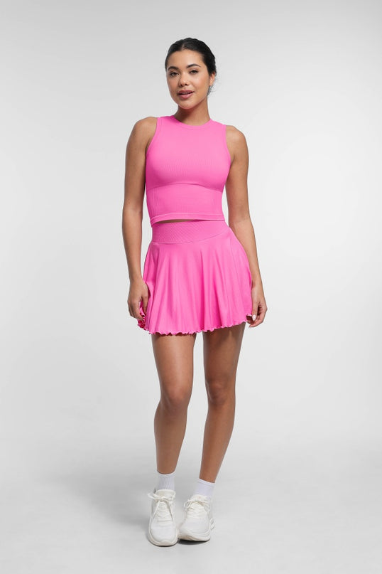 Fusta Roz Fitness cu Volane si Pantaloni Scuti Incorporați, Design 2 in 1, cu Buzunar Lateral perfecta pentru antrenament